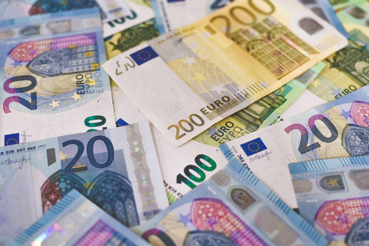 The Art of Drawing Readers In: Your attractive post title goes here Close-up of various Euro banknotes scattered on a surface, highlighting European currency.